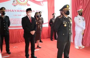 Hadiri HUT Bhayangkara ke-75, Andrei Angouw Ajak Sukseskan Vaksinasi Hebat