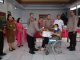 Semarak HUT Ke-78 Bhayangkara, Polres Minahasa Serahkan Bantuan Sosial di Desa Tounelet Kakas